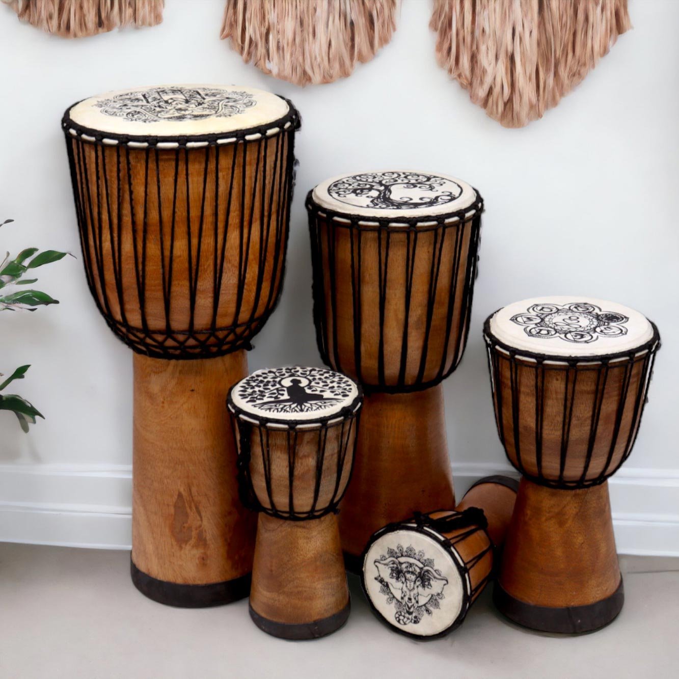 Handcrafted wooden Djembe Drums in different sizes