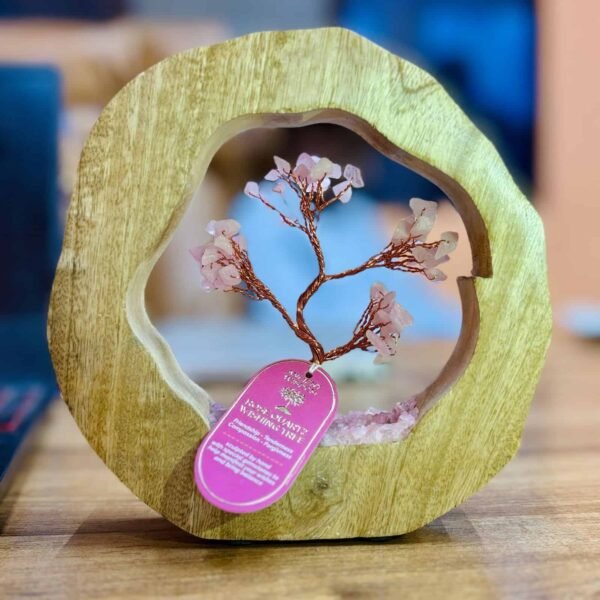 Delicate rose quartz wishing tree sculpture inside wooden heart-shaped frame, ideal for meaningful gifts and home décor, handcrafted with copper wire, great for birthdays or special occasions.