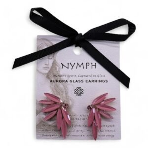 Shimmering pink Aurora glass earrings with elongated petal design, mounted on decorative backing card with black ribbon bow, perfect for nature-inspired gift or jewelry accessory.