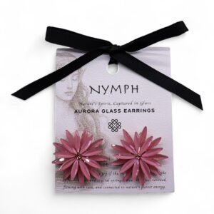 Pink flower-shaped Aurora glass earrings with a floral design, presented on a branded card tied with a black ribbon, perfect as a nature-inspired gift from Sunshine Gifts.