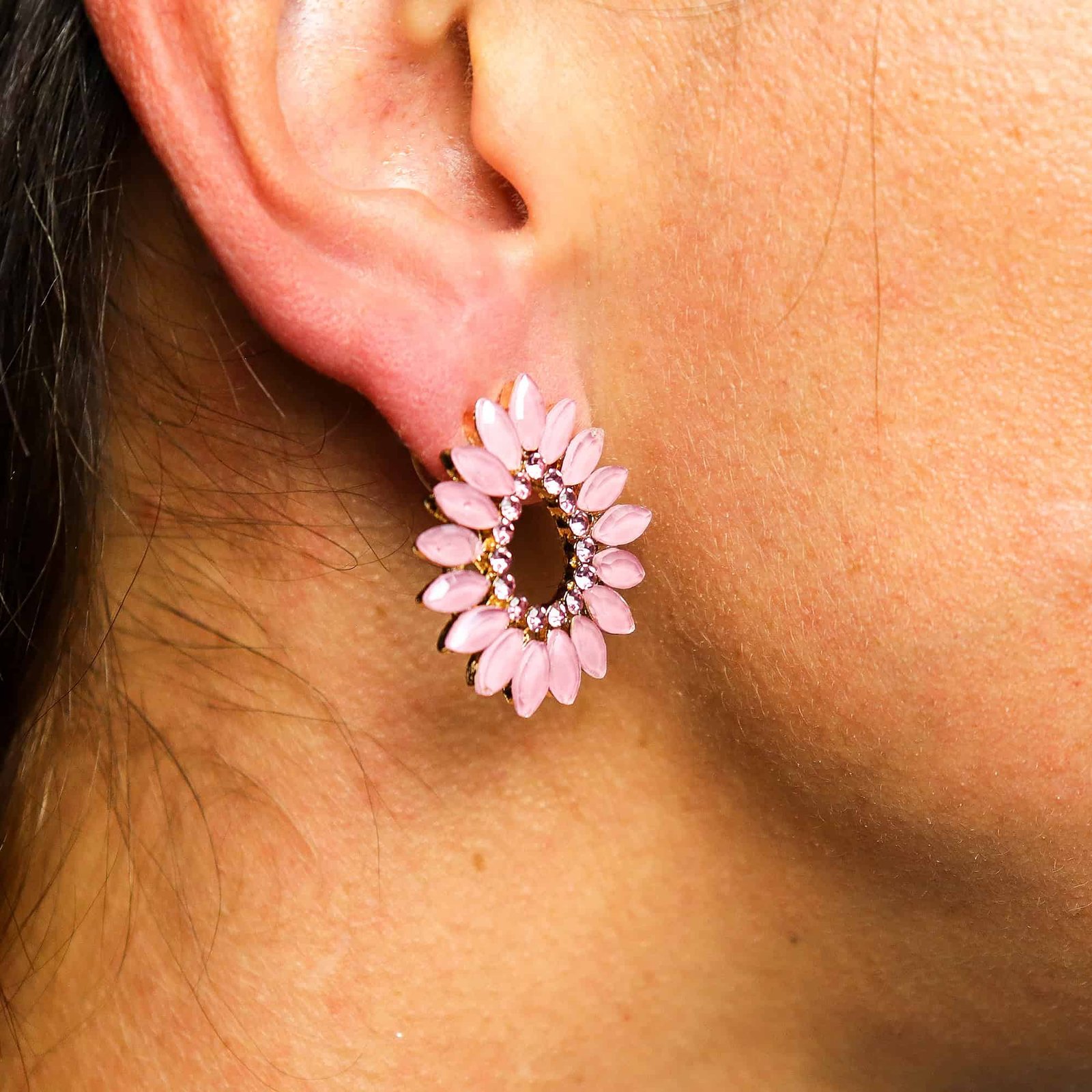 Shimmering pink floral-styled earrings with rhinestones, perfect for gifting or special occasions. Elegant jewellery for women from Sunshine Gifts.