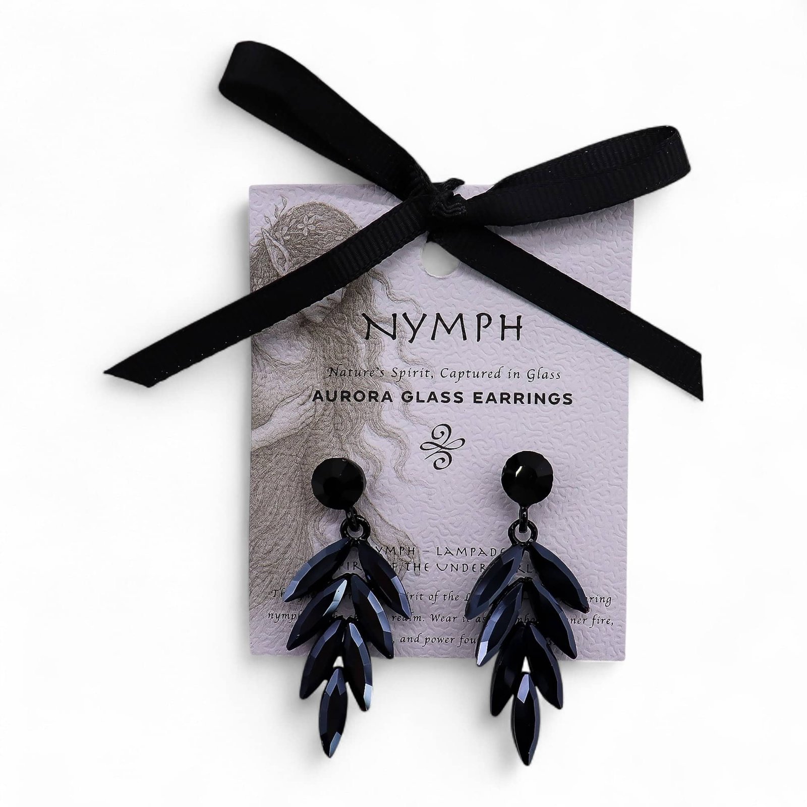 Delicate black Aurora glass earrings inspired by nature, featuring leaf-like designs, presented on a branded card with a black ribbon bow, perfect for elegant gift-giving.