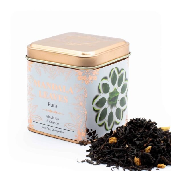 Decorative tin containing Mandala Leaves Pure Black Tea and Orange Peel, ideal for tea lovers and gift-giving.