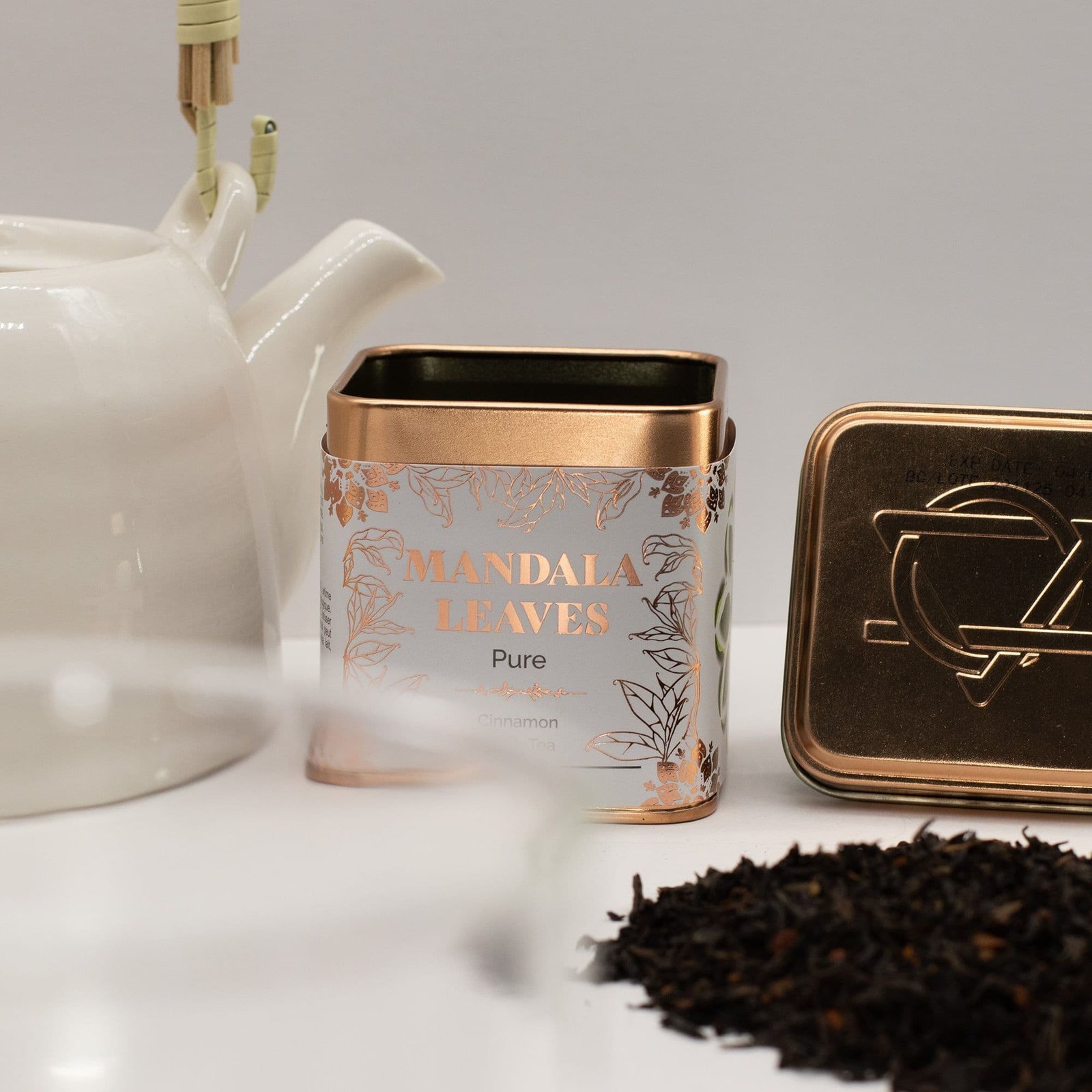 Elegant Mandala Leaves tea tin with floral design, perfect for gifting or storing premium tea blends. Compact and stylish, ideal for tea lovers.