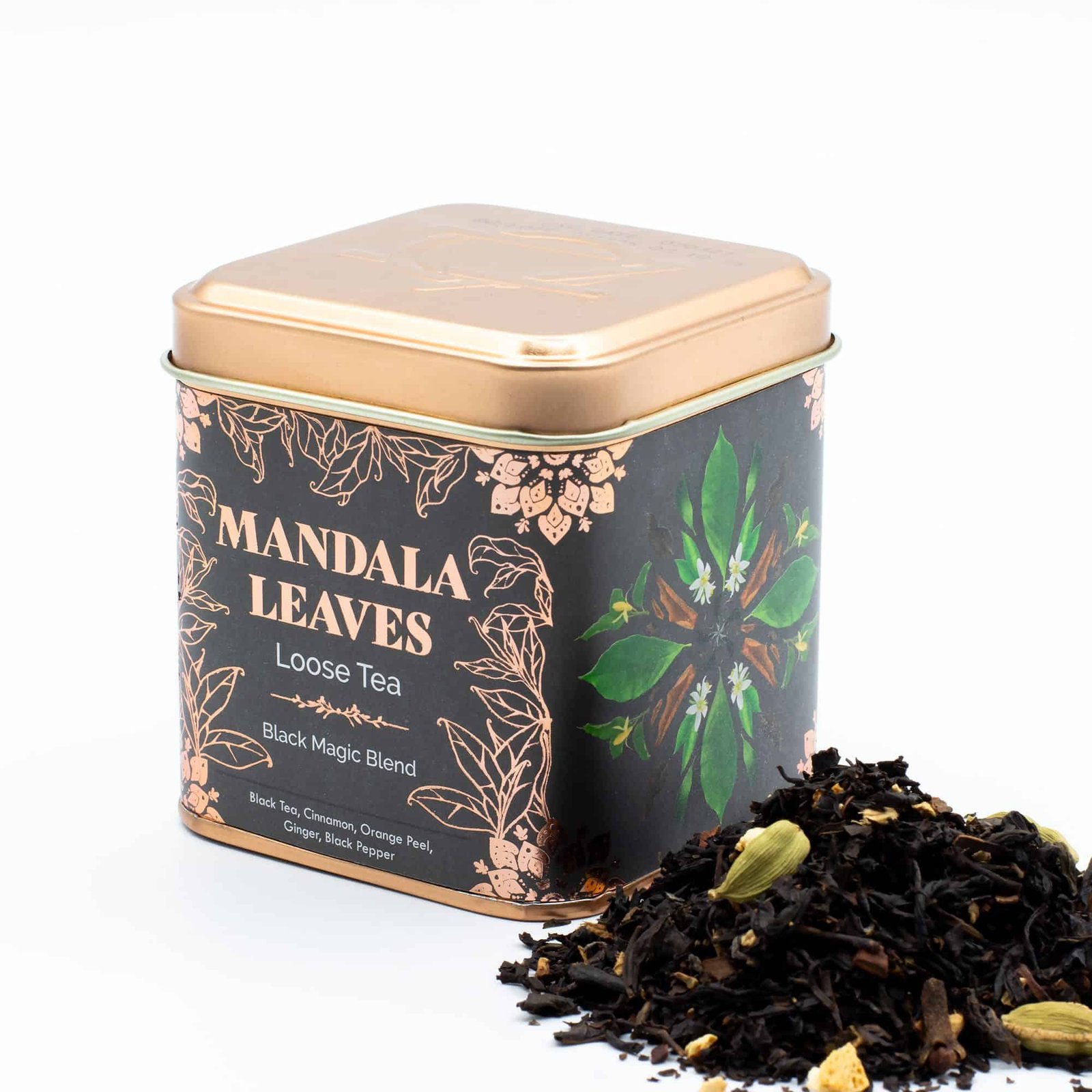 Decorative tin of Mandala Leaves loose tea with black magic blend, featuring green leaves and herbal ingredients, ideal for tea lovers and gift sets.